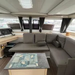Saloon and chart table - Used catamaran Fountaine Pajot Lucia 40 for sale by your Canet Boat Plaisance dealer in the Mediterranean